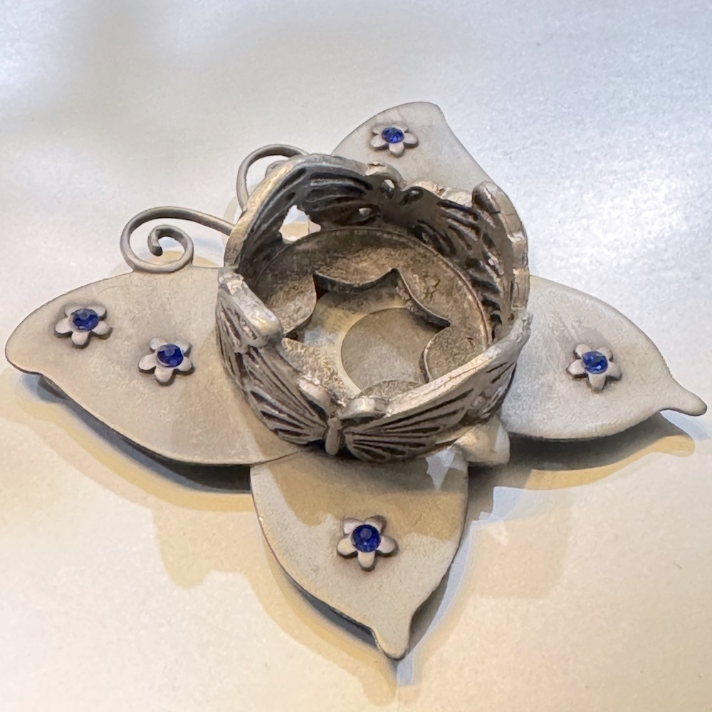 Silver‎ Butterfly Votive Candle Holder with blue gems to
Sparkle
